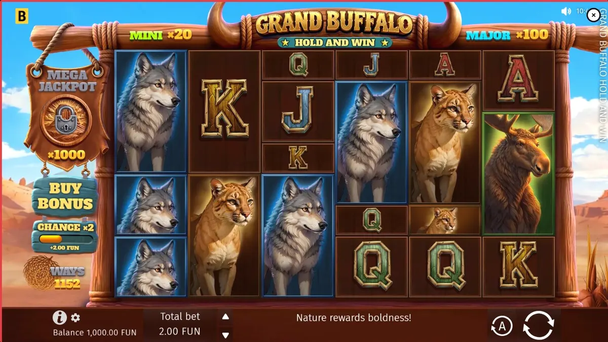 Grand Buffalo Hold and Win slot game interface with desert theme